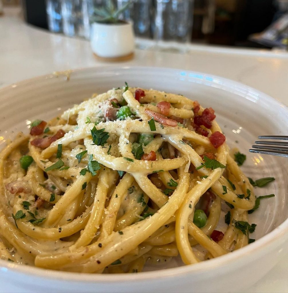 Low Country Carbonara with tasso, English peas and quail egg 