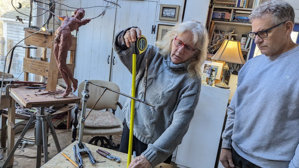 Steve Roy and Renee Rhodes in her Studio Working on Infinite Possibilities Maquette (Courtesy of Paul Barefoot)
