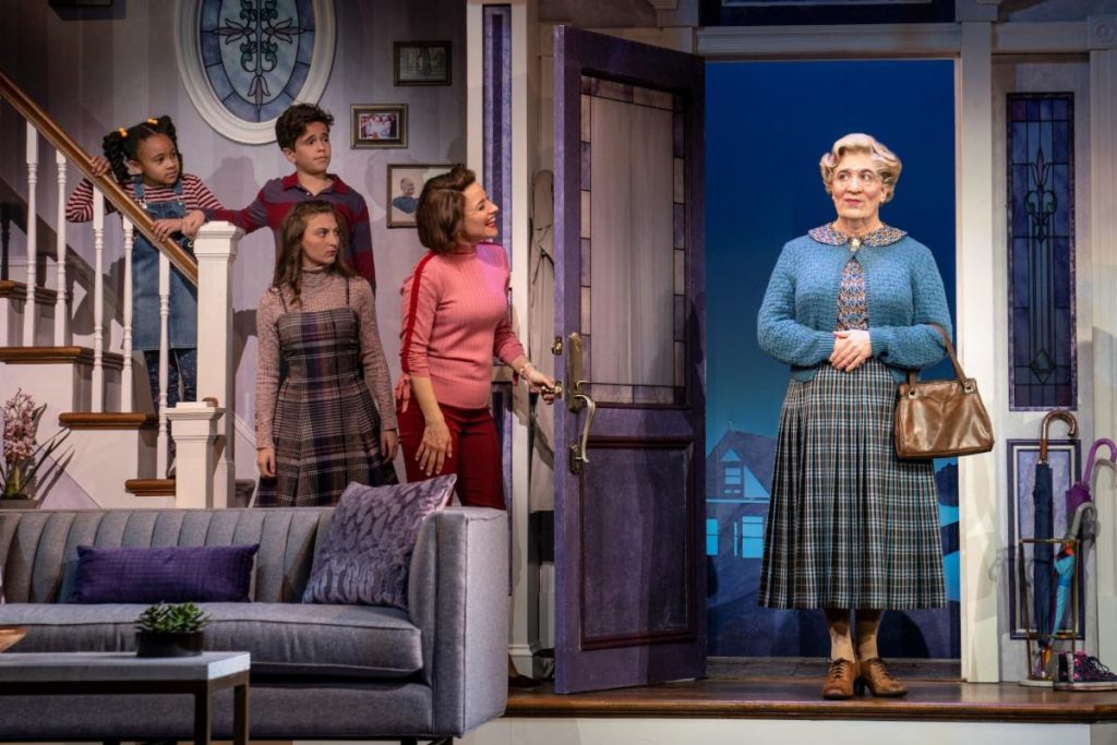 Austin Elle Fisher (Natalie Hillard), Tyler Wladis (Christopher Hillard), Analise Scarpaci (Lydia Hillard), Jenn Gambatese (Miranda Hillard) and Rob McClure (Daniel Hillard as Euphegenia Doubtfire) in the Original Broadway Cast of Mrs. Doubtfire. Photo by Joan Marcus.