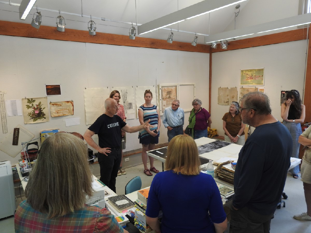 Todd Bartel engages visitors at his open studio photo via National Park Service