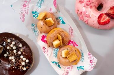 Chef Zac Young at Sprinkletown Donuts & Ice Cream; Donuts and High Roller Donuts at Sprinkletown Donuts & Ice Cream
Credit: Luke Dent Foxwoods Resort Casino; Sarah Shearin