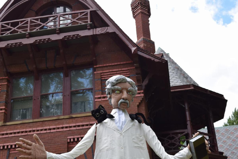 Image of Anne Cubberly's Giant Puppet of Mark Twain and his cat Bambino courtesy of The Mark Twain House & Museum.