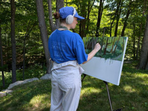 July 2024 Artist Sonja Haroldson painting outdoors at Weir Farm NHP in Wilton Connecticut