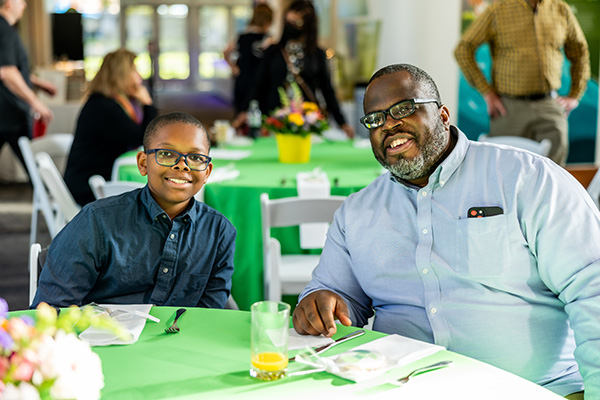 7th grader Caleb Hayes with his dad