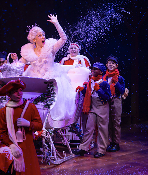 Rebecka Jones as The Ghost of Christmas Past with child cast in Hartford Stage's A Christmas Carol - A Ghost Story of Christmas. Photo by T. Charles Erickson.